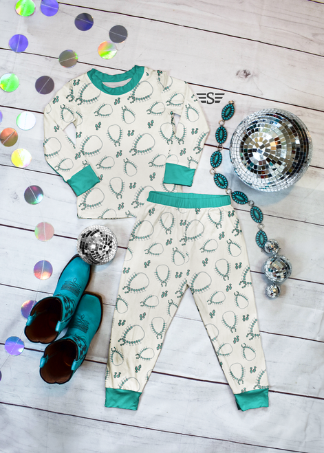 Drippin in Turquoise pajamas, bamboo two piece pajamas, western bamboo pajamas, cowgirl bamboo pajamas, cowboy bamboo pajamas, squash blossom pajamas, turquoise baby pajamas, western toddler pajamas, bamboo kids pajamas, boutique western sleepwear, bamboo toddler sleepwear, western children's pajamas, southwestern baby pajamas, western boutique clothing, Flying S Company