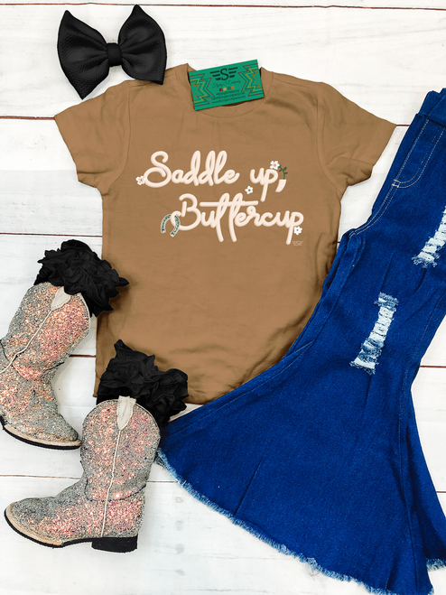 Kids Saddle Up Buttercup Shirt, Saddle Up Buttercup Kids Tee, Saddle Up Buttercup Shirt, Kids Western Graphic Tee, Girls Western Graphic Tee, Kids Cowgirl Shirt, Girls Cowgirl Shirt, Western Kids Shirt, Western Girls Shirt, Cowgirl Graphic Tee, Kids Rodeo Shirt, Girls Rodeo Shirt, Kids Horse Shirt, Girls Horse Shirt, Horse Lover Shirt for Girls, Kids Horseshoe Shirt, Western Boutique Kids Clothing, Cowgirl Kids Clothing, Little Cowgirl Shirt, Youth Western Shirt, Toddler Western Shirt, Western Toddler Tee, Girls Graphic Tee, Kids Country Shirt, Rodeo Kids Clothing, Western Kids Apparel, Cute Cowgirl Shirt, Southern Kids Shirt, Barn Kids Shirt