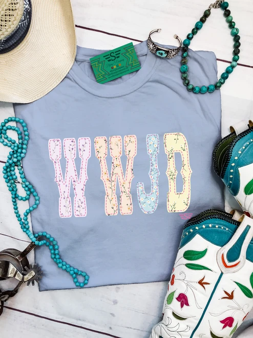 WWJD shirt, WWJD tee, What Would Jesus Do shirt, Christian graphic tee, Christian western shirt, western faith shirt, floral WWJD shirt, wildflower Christian tee, floral Christian shirt, faith based graphic tee, women’s Christian shirt, western Christian apparel, cowgirl Christian shirt, retro Christian tee, vintage floral shirt, colorful Christian shirt, Christian boutique clothing, western graphic tee, faith inspired shirt, Christian cowgirl tee, Jesus shirt for women, western church shirt, Flying S Company