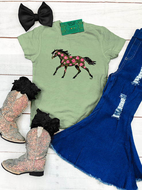 Floral painted pony kids shirt, floral horse kids graphic tee, pink flower horse shirt for girls, western floral kids shirt, painted pony youth tee, cowgirl floral graphic shirt, girls western horse shirt, floral painted horse kids tee, pink floral pony shirt, hand painted horse graphic tee, western boutique kids clothing, horse lover shirt for girls, girly western kids shirt, floral cowgirl youth tee, boho western kids shirt, colorful horse graphic tee, western fashion for girls, running horse kids shirt, floral horse illustration tee, western rodeo kids shirt, stock show girls shirt, rustic floral horse shirt, trendy cowgirl kids tee, pink flower western shirt, youth equestrian graphic tee, western boutique girls clothing, Flying S Company