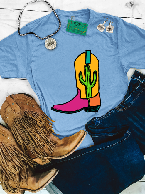 Cactus boot graphic shirt, cactus cowboy boot shirt, western boot graphic tee, bright western shirt, colorful cowgirl boot tee, cactus western shirt, western graphic tee, turquoise cactus boot shirt, yellow and pink boot shirt, desert western tee, western boutique women's shirt, cowgirl graphic shirt, retro cowboy boot shirt, western rodeo shirt, stock show graphic tee, cowgirl fashion shirt, colorful western clothing, cowboy boot graphic tee, cactus cowgirl shirt, western boutique clothing, Flying S Company