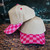 canvas front cap, red checkered hat, pink checker cap, game day trucker, Magna Pony™, ponytail cap, boutique baseball cap, trendy hat, red and pink gingham hat, western style cap, custom canvas hat, handmade women’s cap, Flying S Company
