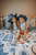 western chinoiserie, blue western baby outfit, cowboy baby clothes, western pajamas, chinoiserie baby gown, blue floral cowboy print, Flying S Company, boutique western baby clothes, kids western set, cowboy zippie, blue and white western, ranch baby outfit, western joggers, western two piece