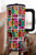 32oz western tumbler, western boot tumbler, colorful cowgirl tumbler, boutique drinkware, insulated stainless steel tumbler, 32oz handled tumbler, flip straw lid tumbler, spill-resistant cup, yeehaw tumbler, western aesthetic drinkware, statement tumbler cup, keeps drinks cold for hours, hot drink friendly, travel-ready tumbler, BPA-free lid and straw, reusable western cup, gift-worthy cowgirl tumbler