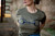 western graphic tee, cowgirl t shirt, snaffle bit shirt, western horse shirt, equestrian graphic tee, rodeo outfit top, ranch wear shirt, olive green western tee, horse lover gift, country western clothing, western boutique top, cowgirl outfit shirt, barn style apparel, rodeo fashion tee, minimalist western shirt, horse bit graphic tee, southern western style, women’s western t shirt, unisex western tee, western aesthetic clothing