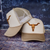 longhorn skull hat, steer skull hat, western hat, cow skull cap, leather patch hat, western patch cap, cowboy hat, rodeo hat, ranch style hat, western accessory, country western hat, longhorn cap, steer skull cap, western boutique hat, rustic cowboy hat, ranch wear accessory, country concert hat, stock show hat, southern western fashion, cowgirl western hat, cowboy lifestyle accessory, engraved leather patch hat, western gift, rodeo fashion accessory, western apparel