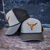 longhorn skull hat, steer skull hat, western hat, cow skull cap, leather patch hat, western patch cap, cowboy hat, rodeo hat, ranch style hat, western accessory, country western hat, longhorn cap, steer skull cap, western boutique hat, rustic cowboy hat, ranch wear accessory, country concert hat, stock show hat, southern western fashion, cowgirl western hat, cowboy lifestyle accessory, engraved leather patch hat, western gift, rodeo fashion accessory, western apparel