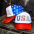 USA patch trucker hat, patriotic boutique hat, americana trucker cap, fourth of july trucker hat, USA letter patch hat, patriotic mesh hat, stars and stripes hat, american pride hat, patriotic foam trucker hat, july 4 boutique hat, statement patriotic hat, trendy USA cap, women’s patriotic trucker hat, patriotic summer hat, red white blue trucker hat, american flag inspired hat, western patriotic cap, boutique trucker hat, patriotic concert hat