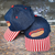 hot dog patch hat, checkered trucker hat, patriotic hot dog cap, retro trucker hat, summer BBQ hat, americana baseball cap, picnic aesthetic hat, checkered brim hat, vintage inspired trucker hat, novelty food hat, county fair hat, july 4th trucker hat, cookout baseball cap, boutique trucker hat, retro americana hat, hot dog graphic cap, summer festival hat, patriotic boutique hat, trendy trucker hat, western summer accessories