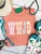 WWJD shirt, WWJD tee, What Would Jesus Do shirt, Christian graphic tee, Christian western shirt, western faith shirt, floral WWJD shirt, wildflower Christian tee, floral Christian shirt, faith based graphic tee, women’s Christian shirt, western Christian apparel, cowgirl Christian shirt, retro Christian tee, vintage floral shirt, colorful Christian shirt, Christian boutique clothing, western graphic tee, faith inspired shirt, Christian cowgirl tee, Jesus shirt for women, western church shirt, Flying S Company