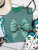 Aztec turquoise coquette bow shirt, turquoise bow shirt, western bow shirt, coquette western shirt, Aztec bow graphic tee, western graphic tee, cowgirl graphic shirt, turquoise western shirt, western coquette tee, southwestern bow shirt, western women’s tee, cowgirl shirt, Aztec print shirt, western boutique shirt, trendy western tee, western bow graphic, turquoise graphic tee, rodeo shirt, stock show shirt, western fashion, western apparel, Flying S Company