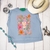 floral steer shirt, floral steer skull shirt, western floral shirt, cow skull graphic tee, western graphic tee, cowgirl graphic shirt, colorful western shirt, pink western shirt, floral cow skull tee, steer skull graphic shirt, western wildflower shirt, boho western shirt, women’s western graphic tee, western boutique shirt, cowgirl floral shirt, rodeo graphic tee, western concert shirt, bright western shirt, trendy cowgirl shirt, western apparel