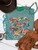 painted ponies shirt, colorful horse graphic tee, western horse shirt, painted horse shirt, cowgirl graphic tee, western floral shirt, colorful western shirt, running horses graphic tee, horse lover shirt, wildflower horse shirt, hand painted horse design, whimsical western shirt, women’s western graphic tee, boho cowgirl shirt, western boutique shirt, rodeo graphic tee, stock show shirt, western concert shirt, bright western shirt, trendy cowgirl tee, floral horse graphic shirt, western fashion