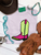 Vibrant check boot graphic shirt, checkered cowboy boot shirt, green check boot shirt, pink cowboy boot graphic tee, colorful western shirt, checkered western boot, western boot graphic tee, bright cowgirl shirt, retro cowboy boot shirt, western boutique women's shirt, cowgirl graphic tee, pink and green boot shirt, trendy western shirt, western rodeo shirt, stock show graphic tee, cowgirl fashion shirt, colorful western clothing, checkered boot graphic tee, cowboy boot shirt, retro western fashion, neon western graphic tee, western boutique clothing, Flying S Company