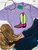 Vibrant check boot graphic shirt, checkered cowboy boot shirt, green check boot shirt, pink cowboy boot graphic tee, colorful western shirt, checkered western boot, western boot graphic tee, bright cowgirl shirt, retro cowboy boot shirt, western boutique women's shirt, cowgirl graphic tee, pink and green boot shirt, trendy western shirt, western rodeo shirt, stock show graphic tee, cowgirl fashion shirt, colorful western clothing, checkered boot graphic tee, cowboy boot shirt, retro western fashion, neon western graphic tee, western boutique clothing, Flying S Company