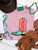 Howdy boot graphic shirt, howdy cowboy boot shirt, western boot graphic tee, colorful cowboy boot shirt, howdy western shirt, retro cowboy boot tee, turquoise cowboy boot shirt, pink howdy shirt, western graphic shirt, cowgirl graphic tee, western boutique women's shirt, colorful western shirt, howdy graphic tee, retro western graphic shirt, bold western shirt, rodeo graphic tee, stock show shirt, country concert shirt, funky western tee, western fashion shirt, cowboy boot graphic tee, western women's clothing, vintage inspired western shirt, Flying S Company