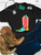 Howdy boot graphic shirt, howdy cowboy boot shirt, western boot graphic tee, colorful cowboy boot shirt, howdy western shirt, retro cowboy boot tee, turquoise cowboy boot shirt, pink howdy shirt, western graphic shirt, cowgirl graphic tee, western boutique women's shirt, colorful western shirt, howdy graphic tee, retro western graphic shirt, bold western shirt, rodeo graphic tee, stock show shirt, country concert shirt, funky western tee, western fashion shirt, cowboy boot graphic tee, western women's clothing, vintage inspired western shirt, Flying S Company