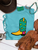 Star boot graphic shirt, star cowboy boot shirt, western graphic tee, colorful cowboy boot shirt, turquoise star boot shirt, lime green star cowboy boot, yellow cowboy boot graphic tee, retro western shirt, funky western graphic tee, vibrant cowgirl shirt, colorful western women's tee, star print cowboy boot shirt, western boutique graphic tee, bright western shirt, retro cowgirl fashion, trendy western apparel, women's cowboy boot shirt, rodeo graphic tee, stock show shirt, country concert outfit, bold western fashion, turquoise western shirt, star western graphic tee, Flying S Company