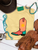 Vibrant sun boot graphic shirt, sun cowboy boot shirt, western graphic tee for women, colorful cowboy boot shirt, sunshine western graphic tee, sunburst cowboy boot shirt, retro western women's shirt, peach cowboy boot graphic tee, coral western graphic shirt, turquoise cowboy boot shirt, sunset western graphic tee, funky western women's shirt, vibrant cowgirl shirt, colorful western boutique tee, retro cowgirl fashion, sunshine cowgirl graphic tee, trendy western apparel, women's cowboy boot shirt, rodeo graphic tee, stock show shirt, country concert outfit, bright western graphic shirt, summer western tee, western boutique clothing, Flying S Company