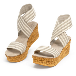 Bermuda platform wedges, featuring a faux-jute platform and a chic, stretchy, wrap around ankle strap Bermuda platform wedges, featuring a faux-jute platform and a chic, stretchy, wrap around ankle strap