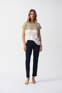 Bring a little shimmer to your casual outfits with this color block metallic sweater knit pullover