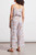Tribal button front jumpsuit with sash