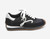 Retro lace-up athleisure sneaker. Padded heel collar. Ultra-padded insole. Two-tone midsole. 1 inch rubber athletic sole.