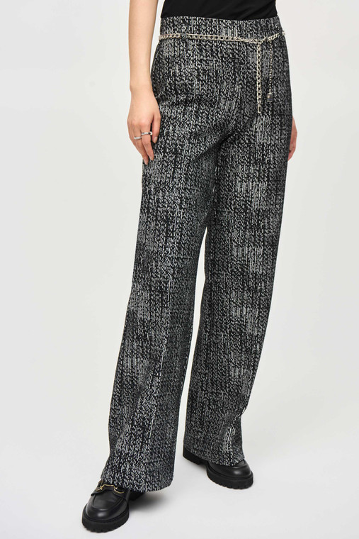 Joseph Ribkoff knit pull-on pants crafted in a luxurious tweed fabric with a chic wide-leg silhouette and delicate chain belt