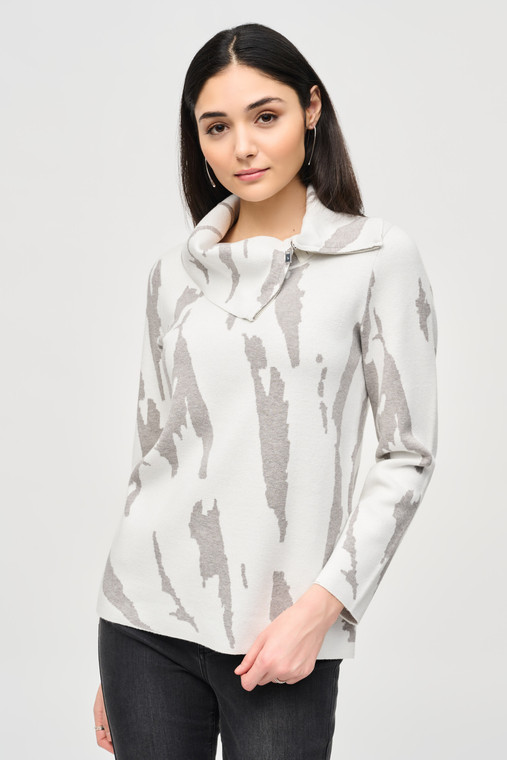 Casual elegance meets sophisticated comfort in this Joseph Ribkoff brushed jacquard knit sweater with a zipped cowl neck.