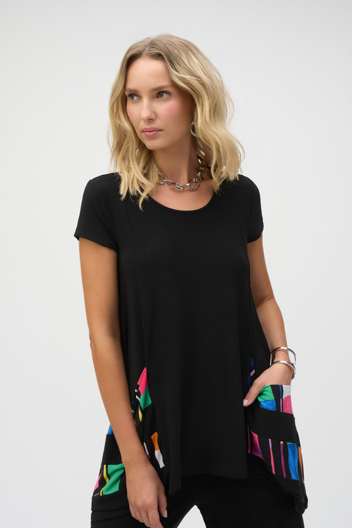 This silky knit tunic features lovely handkerchief detail at the hem, a scoop neckline and striped print band on the applied pockets.