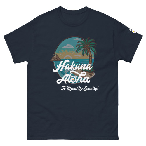 Hakuna Aloha/Tropical Paradise' Men's Tee - Front View. Dark navy tee featuring a vibrant digital background of a sunny day in a tropical paradise with a bright blue ocean, an island, and a green palm tree. 'Hakuna Aloha' is written in white over the background, and 'It means no laundry' is written below. Small white Aloha washer icon on the left sleeve adds a touch of tranquility.