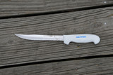 The Tiger edge knife on the dock.