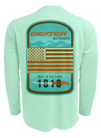 Dexter Outdoors RETRO Performance shirt in aqua green featuring the Dexter flag and 1818 icon on the back.
