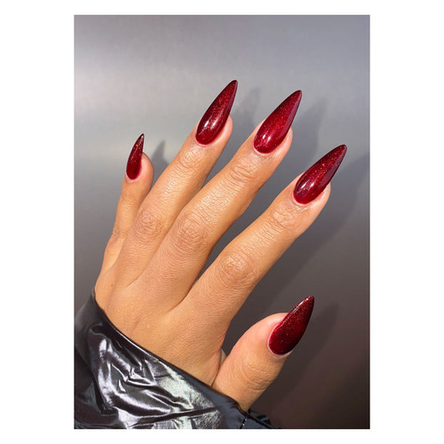 Stilleto red and glittery nails using Eclipse Mini from The GelBottle Inc