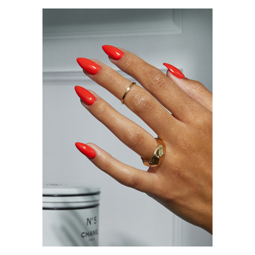 Manicure using "Stiletto" from The GelBottle Inc. showing off a bright warm red gel polish with orange undertones.