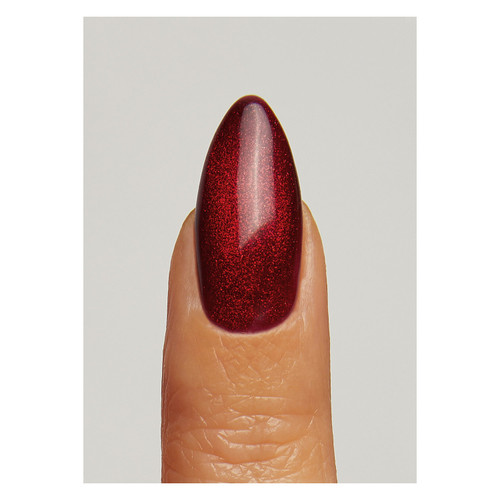 Close up of a nail panted with a deep red and golden shimmer magnetic gel polish "Amore Magnetic" from The GelBottle Inc
