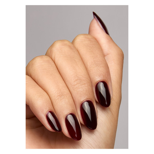 Close-up of manicured nails wearing Manor by The GelBottle Inc., showcasing a timeless deep rouge noir color with high-gloss shine.