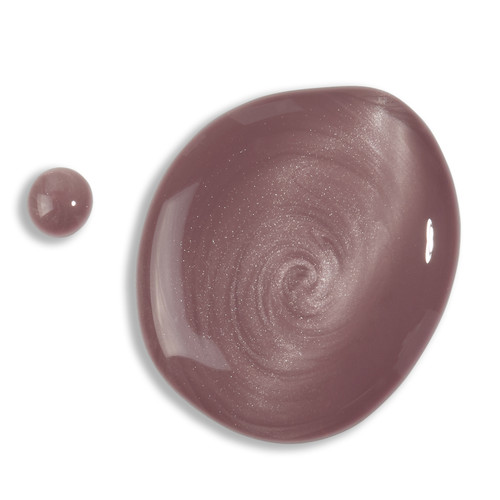 Texture swatch of a mauve magnetic cat eye gel polish from The GelBottle Inc. showing swirling metallic particles and glossy finish