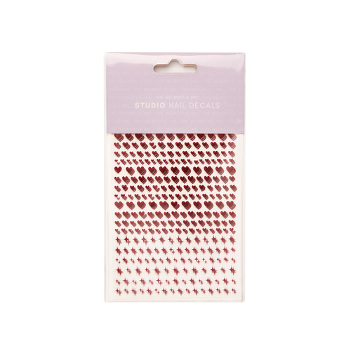 Pack of Red Hearts & Twinkles Studio Nail Decals by The GelBottle Inc., featuring red heart and star-style designs for nail art.