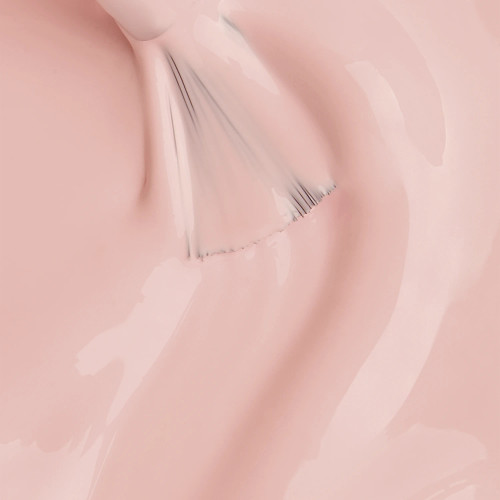 Nail brush gliding through semi-sheer pink-white gel showing the smooth texture of Dolly Hard BIAB from TGB. Hard gel formula made TPO & HEMA-Free