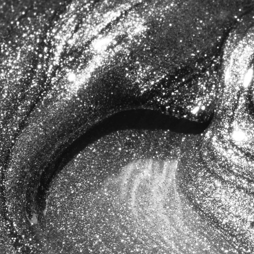 Close up of Countdown Magnetic from The GelBottle Inc: a soak-off high shine silver gel polish made 100% TPO-free. Perfect for holiday cat-eye nail designs