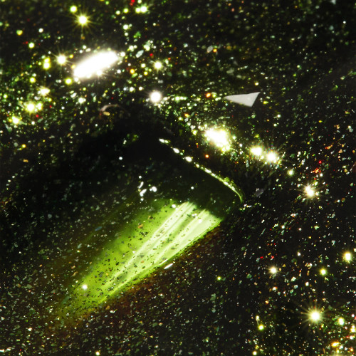 Nail brush moving through bright light green holiday gel polish with a foiled metallic shimmer finish. Kevin! by TGB is 100% TPO-free with soak-off removal