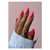 Darker tone skin manicure showing off watermelon red "Bae Watch Mini" from TGB Inc.