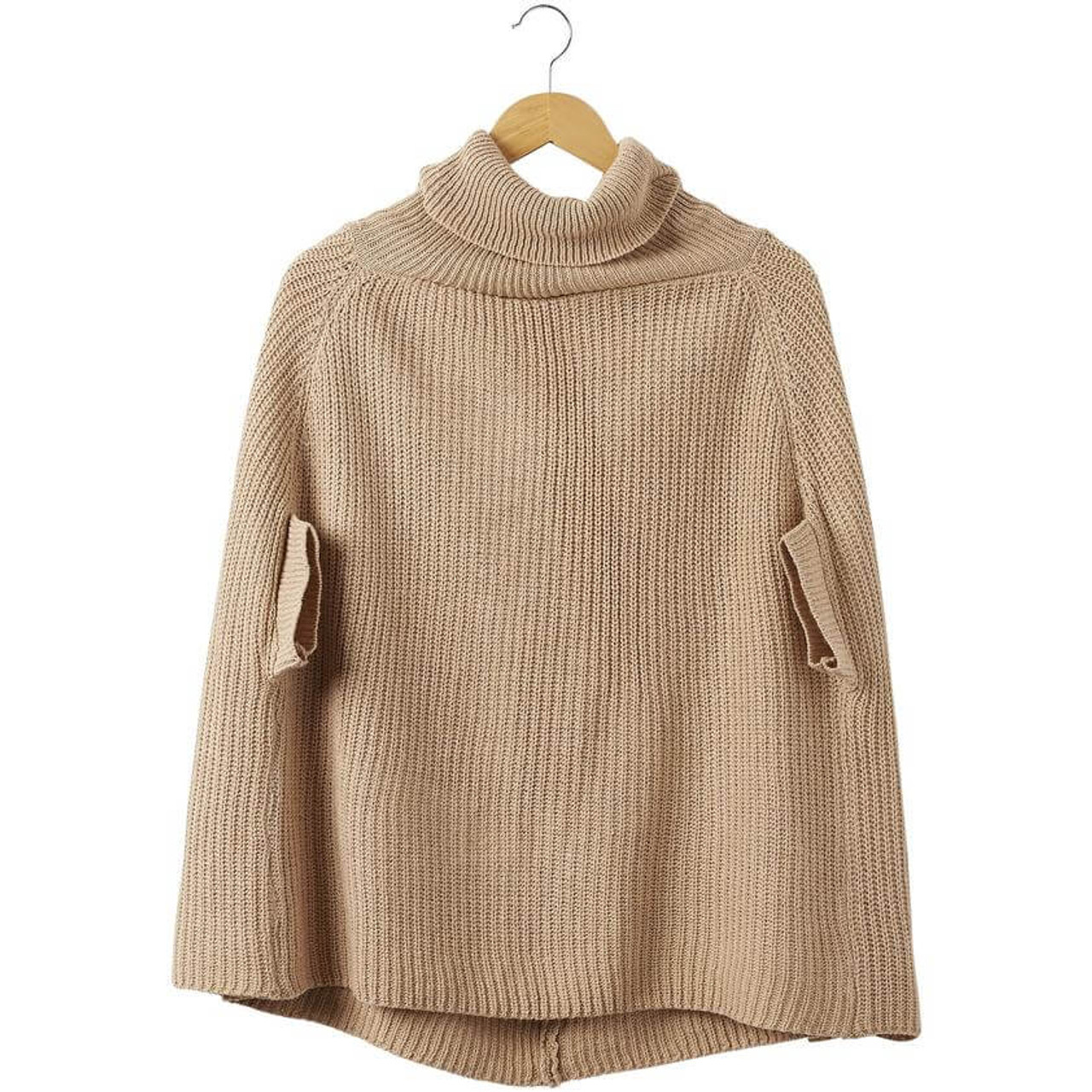 This modern sweater knit khaki Victoria poncho is perfect for the office, a day of shopping, or even date night. The neutral color and effortless style will have you looking chic and feeling warm wherever you go. One size fits most.