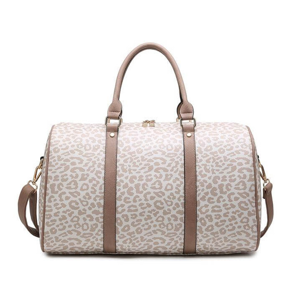 vegan leather duffel bag! Blush colored vegan leather and rose gold metal details. Includes one zipper and two slip pockets on the inside. The top zips closed and an adjustable/detachable shoulder strap is included vegan leather duffel bag! Blush colored vegan leather and rose gold metal details. Includes one zipper and two slip pockets on the inside. The top zips closed and an adjustable/detachable shoulder strap is included