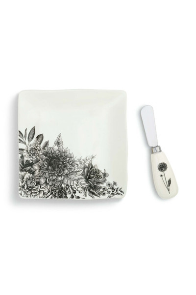 The spreader is crafted from stainless steel with a ceramic handle, while the plate is made of glazed stoneware. Both items are decorated with a black and white floral scene that has a hand-drawn feel. When it's time to host, spread and serve cheese, sauces, or butter with the spreader and pile the plate high with tasty bites. Kitchen essentials make great gifts for friends and family that will use them often and be reminded of you every time they do. The spreader is crafted from stainless steel with a ceramic handle, while the plate is made of glazed stoneware. Both items are decorated with a black and white floral scene that has a hand-drawn feel. When it's time to host, spread and serve cheese, sauces, or butter with the spreader and pile the plate high with tasty bites. Kitchen essentials make great gifts for friends and family that will use them often and be reminded of you every time they do.