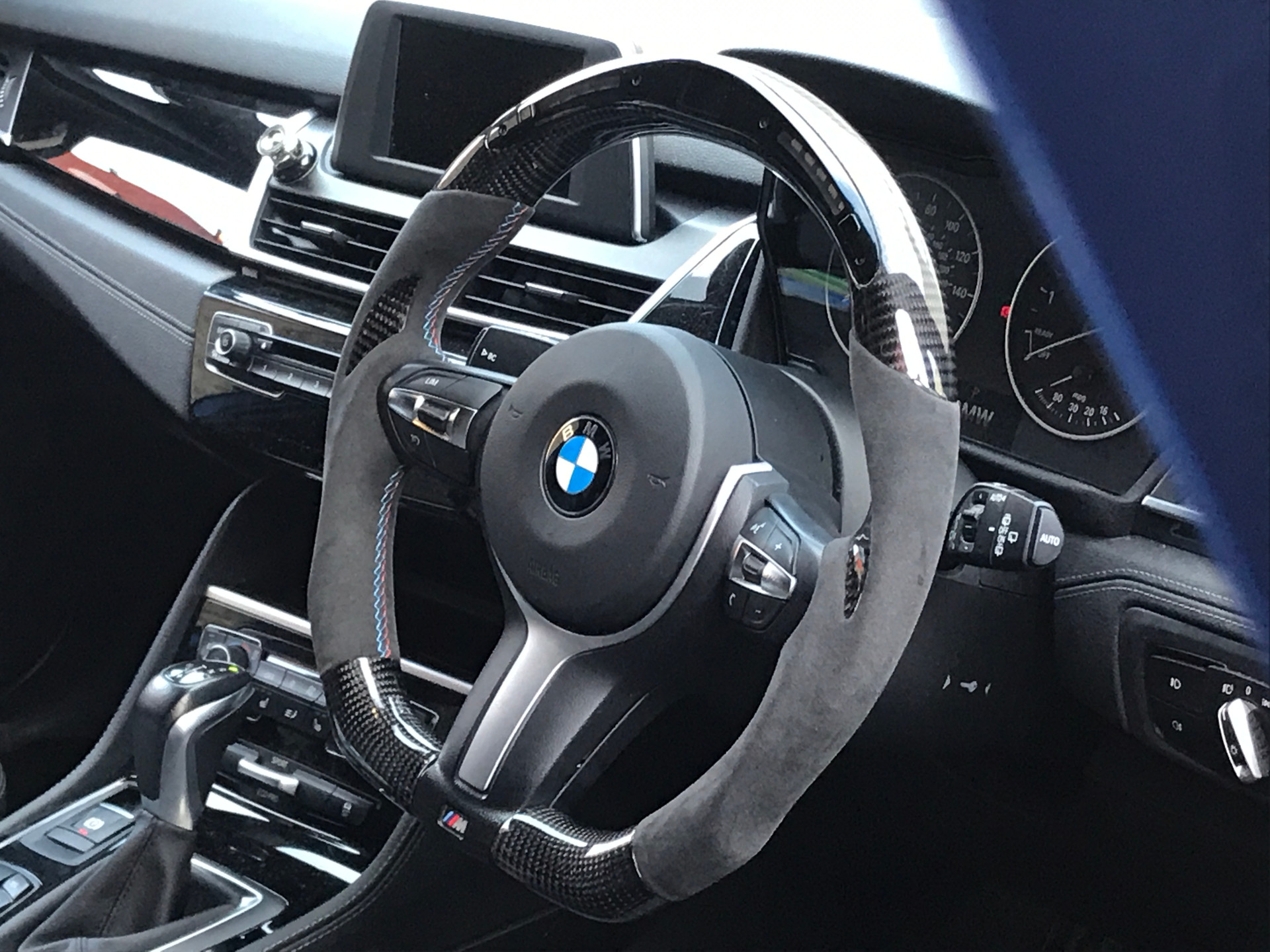 Installation of our new custom carbon LED steering wheel on BMW F