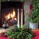 Blueberry Holiday Centerpiece with Candles Lit
The Blueberry Holiday Centerpiece with the ivory taper candles lit, creating a warm, festive glow. Ideal for adding ambiance and holiday cheer to any Christmas dining table.