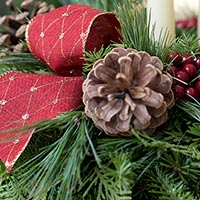 winter harbor close up of bow and berries centerpiece