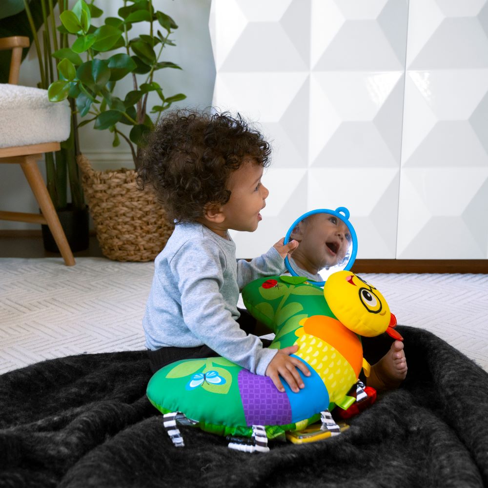 BABY EINSTEIN 
CAL-A-PILLOW TUMMY TIME ACTIVITY PILLOW